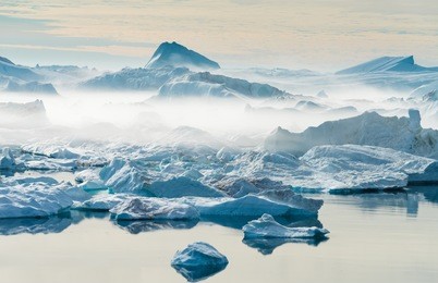 stranded icebergs at the mouth of the icefjord near ilulissat, greenland