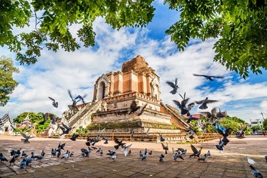 chedi luang pagoda in the morning, wat chedi luang temple with cloudy  and blue sky- chiang mai, thailand.