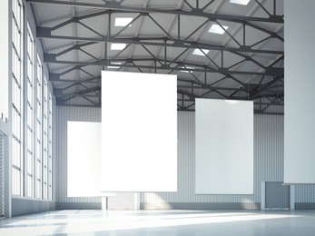 blank white banners in bright hangar. 3d rendering