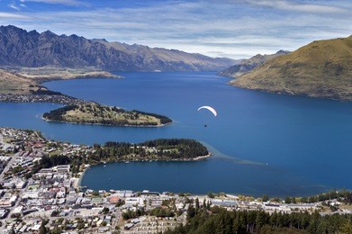 tandem paragliding over lake wakatipu in queenstown, new zealand