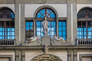 sculptures outside palace uffizi. uffizi gallery is the most famous museum in florence. its collection of renaissance paintings, housed in a sixteenth-century palace. italy.