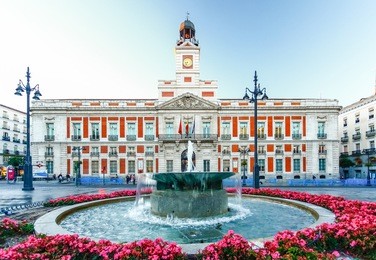 the old post office at puerta del sol, km 0, madrid, spain