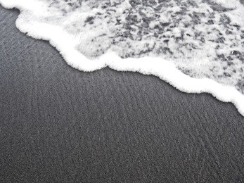punaluu black sand beach, hawaii island