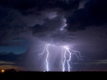 lightning display at sunset in southwestern united states.