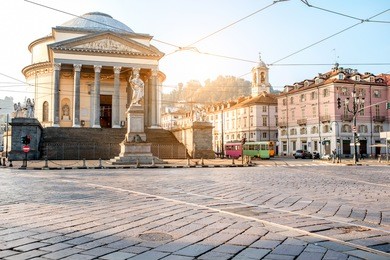 turin cityscape view on gran madre square with church and vittorio emanuele statue in the morning