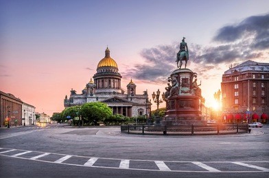 st. isaac's cathedral under the blue sky and pink monument to nicholas the first on st. isaac's square in the early morning