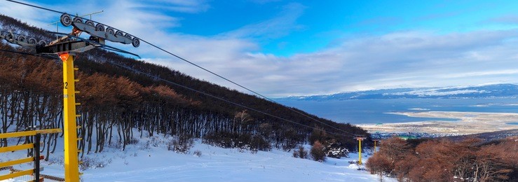 panoramic view of martial glacier full of snow in the top at ushuaia, tierra del fuego, argentina. a beautiful place to practice winter sports such as skiing. chairlifts for winter sports.