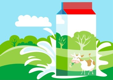 milk carton is on the background of green meadows
