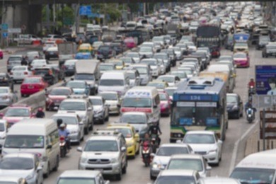 blurred traffic jam with sunlight on  street in bangkok , thailand