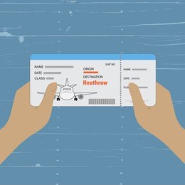 two hands holding a plane ticket. arriving to heathrow