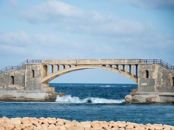 bridge in alexandria, egypt, on a sunny morning