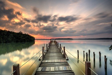beautiful long exposure sunrise shot at jetty. image contain certain grain or noise and soft focus when view at full resolution
