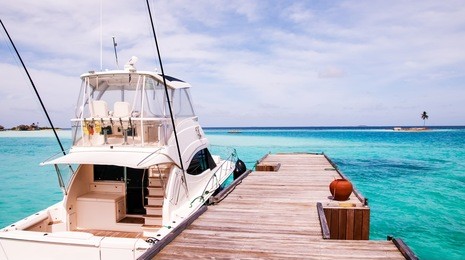 speed boat maldives at tropical resort to airport island and resort  deep blue sea 16:9 scale background concept color 