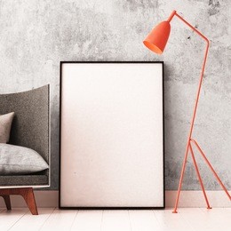 mockup poster in the interior with an armchair in loft style. 3d
