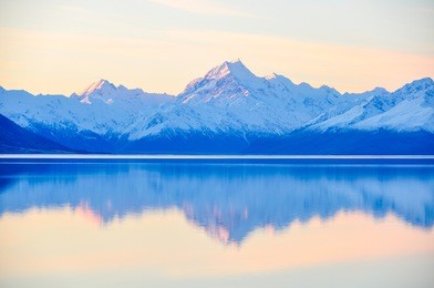 sunset colors and reflection at mount cook n the aoraki/mount cook national park, new zealand