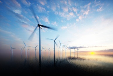 offshore wind park at daybreak. 3d rendering.