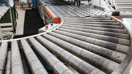 new modern assembly roller line in a factory.