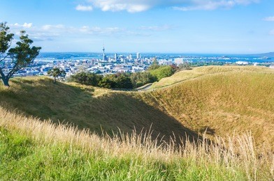 top of the mount eden volcano with amazing view of auckland. high peak of the tourist season. new zealand                