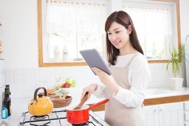 young asian woman in the kitchen