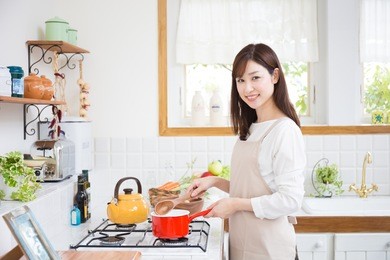 young asian woman in the kitchen