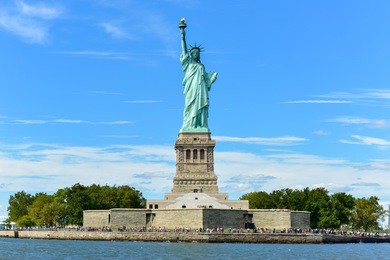 the statue of liberty from liberty harbor.