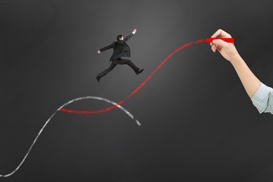 the second curve concepts, woman hand holding chalk drawing two curves with businessman jumping.