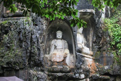 rock reliefs at feilai feng at the lingyin temple (temple of the soul's retreat) complex. one of the largest buddhist temples in china
