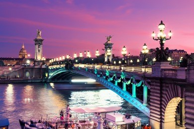 alexandre bridge in paris at night in illumination, toned image.