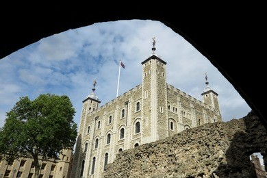 white tower, tower of london, viewed through archway, day
