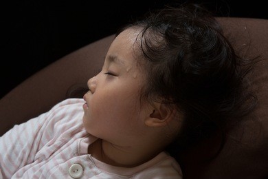 asian girl gets high fever