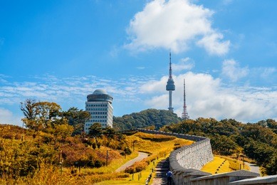 seoul tower and red autumn at namsan mountain in south korea.