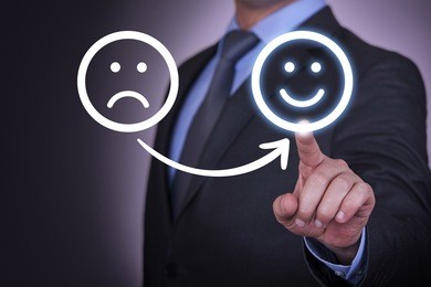 unhappy and happy smileys on touch screen