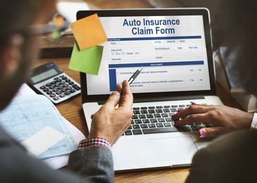 auto insurance claim form document indemnity concept