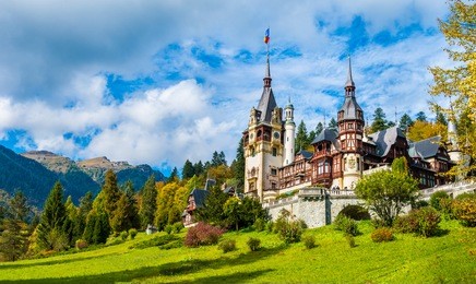 peles castle sinaia in autumn season, transylvania, romania protected by unesco world heritage site