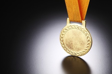 close up of the golden medal