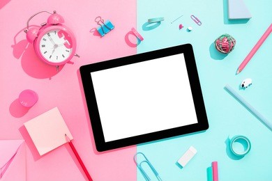 back to school concept. blank tablet with school and office supplies on office table. flat lay with copy space.