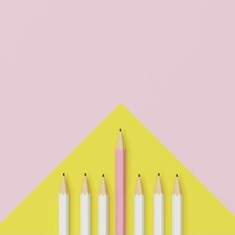 pink pencil and white pencil on yellow and pink background. minimal creative concept.