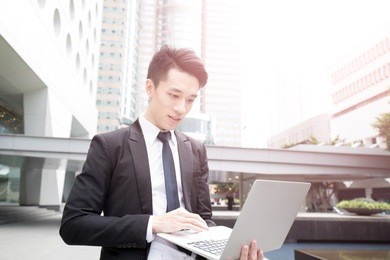 businessman use computer in honkong, asian