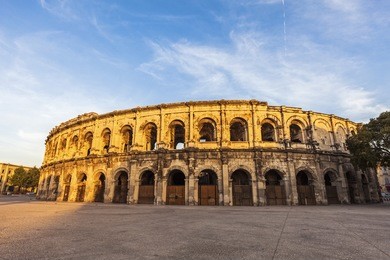 arena of nimes at sunset. nimes, occitanie, france.