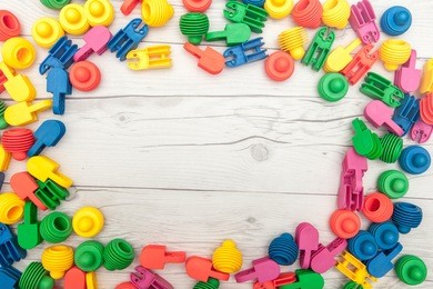 colorful rubber block toys for kids play on wooden desk