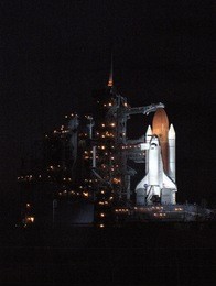 discovery on launch pad at night - best for web use