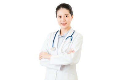 smiling asian woman doctor with stethoscope cross arms. isolated on white background. medical and health concept