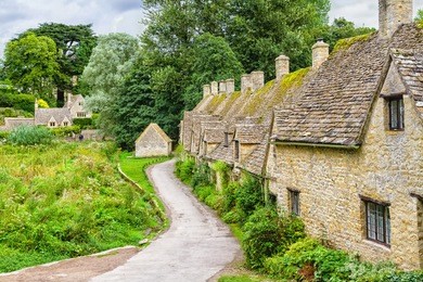houses of arlington row in the village of bibury, england, united kingdom