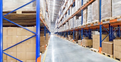 huge distribution warehouse with high shelves. bottom view.