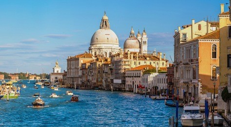 basilica santa maria della salute and grand canal in venice in a beautiful summer day in italy