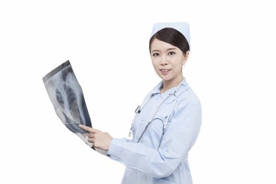 	portrait of young doctress holding x-ray	