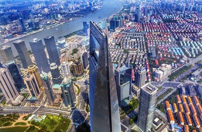looking down on black shanghai world financial center skyscraper reflections huangpu river cityscape liujiashui financial district shanghai china.