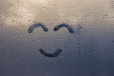 the inscription smile on the sweaty glass 