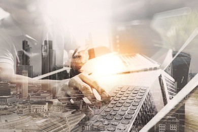 double exposure,outsource developer working on marble desk with laptop computer mobile application software and digital tablet dock smart keyboard,compact server