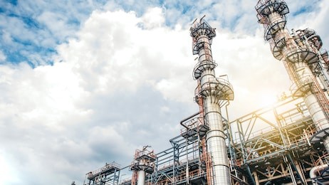 industrial zone,the equipment of oil refining,close-up of industrial pipelines of an oil-refinery plant,detail of oil pipeline with valves in large oil refinery.